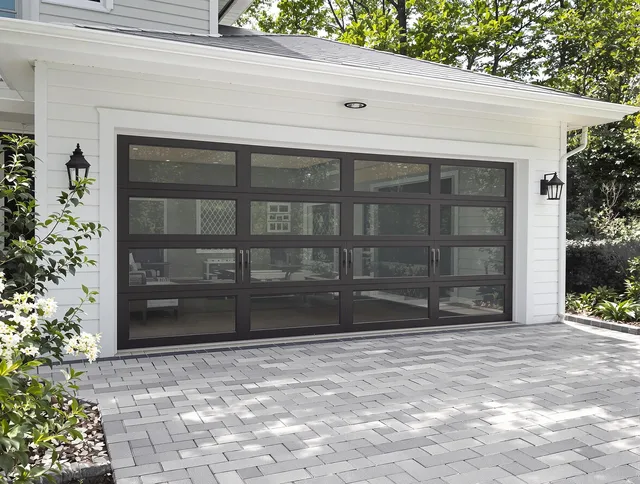 Newington Garage Door Repair design specialist presenting custom garage door options to Newington homeowner